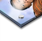 Curious child carried in a patterned fabric sling. Acrylic print