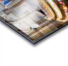 Visitors light votive candles near statue in Strasbourg Cathedra Acrylic print