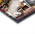 Moroccan babouches shoes in a Fez shop with a vendor Acrylic print