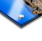 Arid desert with unusual rock pillars against a blue sky. Acrylic print