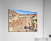 Namibia. A guide shows prehistoric rock engravings in Twyfelfontein archaeological site Acrylic Print