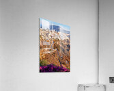 Picturesque Santorini cliffside town with winding path and vibra Acrylic Print