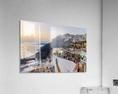 Santorini cliffside town with restaurants and people enjoying th Acrylic Print