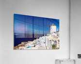Santorinis iconic white architecture and windmill against the d Acrylic Print