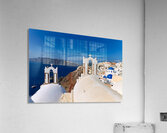 Santorinis iconic white churches blue domes and caldera view. Acrylic Print