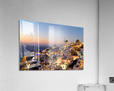 Santorinis Oia village glows at twilight by the sea. Acrylic Print
