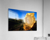 Carved stone monument in the Australian outback at sunset. Acrylic Print