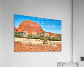 Vast red rock formation under a clear blue sky. Impression acrylique
