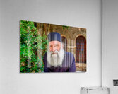 Elderly man with a beard poses near a historical building in a g Acrylic Print