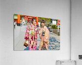 Young women enjoy Fushimi Inari Taisha Shrine in Kyoto Japan Acrylic Print