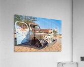 Classic car wreck in Namibias desert environment Acrylic Print