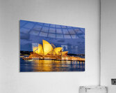 Sydney Opera House illuminated at dusk with harbor lights. Acrylic Print