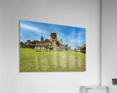 Angkor Wat temple complex with green grass and blue sky. Acrylic Print