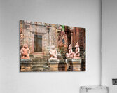 Ancient Cambodian temple with intricate red sandstone carvings a Acrylic Print