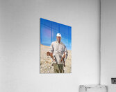 Shepherd holds his young goats in Namibia under bright blue sky Acrylic Print