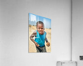 Joyful boy in Kavango Region of Namibia enjoys a moment outside Acrylic Print