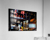 Neon signs light up a busy street in Hong Kong at night Acrylic Print