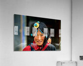 Traditional woman carries child in Tibet with ornate hair decora Acrylic Print