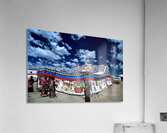 Colorful Tibetan tent with people under a cloudy sky in Tibet Acrylic Print