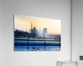 Swimming in infinity pool overlooking Dubai skyline at sunset Acrylic Print