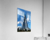 Burj Khalifa stands tall against a blue sky in Dubai UAE Acrylic Print