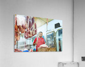 Butcher works with meat in a shop in Dubai UAE Acrylic Print