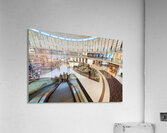 Busy shopping mall in Dubai with escalators and various stores Acrylic Print