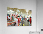 Butchers work at a busy meat market in Dubai UAE preparing fresh Acrylic Print