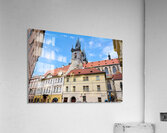 Pragues Týn Church and historic buildings under blue sky. Acrylic Print