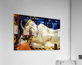 Reclining Buddha statue in Shanghai temple with flowers and gold Acrylic Print