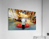 Worshipper kneels before Buddha statue in Shanghai temple Acrylic Print