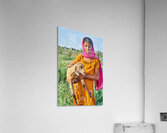 Girl holds goat in Khimsar Rajasthan India during sunny day Acrylic Print
