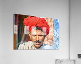 Man in red turban poses in Rajasthans Jaisalmer market street Acrylic Print