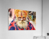 Old holy man in Varanasi wearing bright colors in Uttar Pradesh Acrylic Print