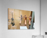 Displays of ancient artifacts are shown in glass cases Acrylic Print