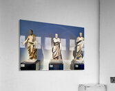 Statues of ancient philosophers displayed in museum setting Acrylic Print