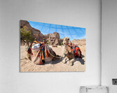 Tourists ride camels at Petra archaeological site in Jordan Acrylic Print