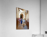 Women walking with donkey in narrow alley of Fez Medina Acrylic Print