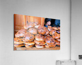 Loaf of bread covered in flies at market in Fez Morocco Acrylic Print