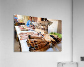 Butcher working in Meknes souk with various cuts of meat Acrylic Print
