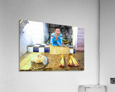 Butcher in Meknes souk interacts with customers during market ho Acrylic Print
