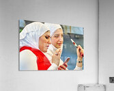Young women enjoy hookah and talk on mobile phone in Aleppo Syri Acrylic Print