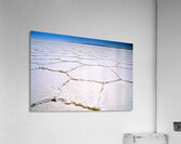 Expansive white salt flat with geometric patterns. Impression acrylique