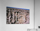 Salt encrusted desert floor under a bright blue sky. Acrylic Print