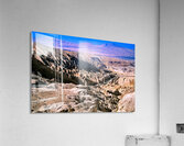Eroded desert landscape with a road winding through mountains. Acrylic Print