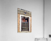 Woman in Kathmandu looks out from window in old building Acrylic Print