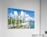 Visitors enjoy view of ArtScience Museum in Singapore near water Acrylic Print