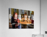 Woman lights candles at Alexander Nevsky Lavra Acrylic Print