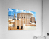 Visitors explore Nizwa Fort a historic site in Oman Acrylic Print