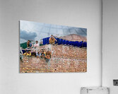 Workers rest during break time at a construction site in Lahore Acrylic Print